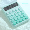 Gradient colour desk calculator showing violet, pink, blue, and green shades on an ABS plastic casing.