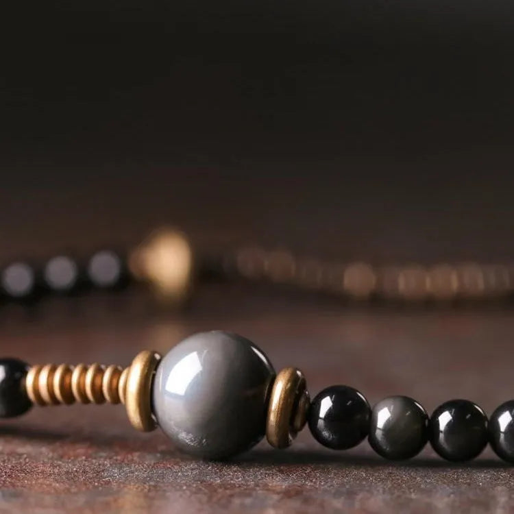 Black multi-layered beaded bracelet with geometric shape and natural retro styling