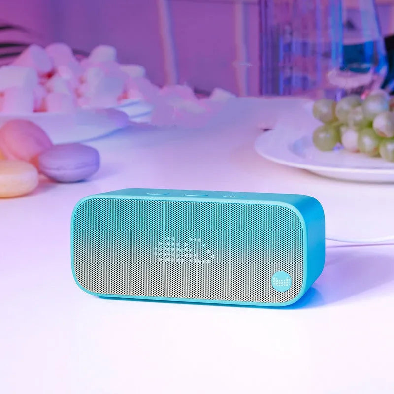 Wi-Fi smart speaker with AI assistant in blue plastic bookshelf design