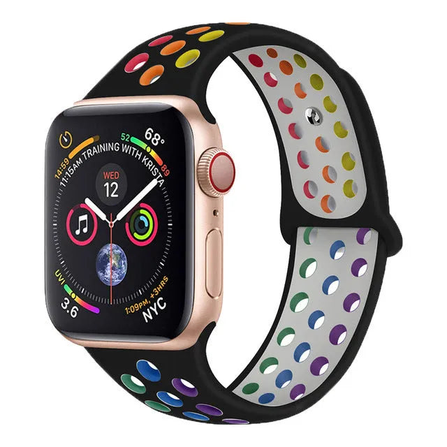 Silicone sports wristband with buckle in black, rainbow or white colour on a wrist.