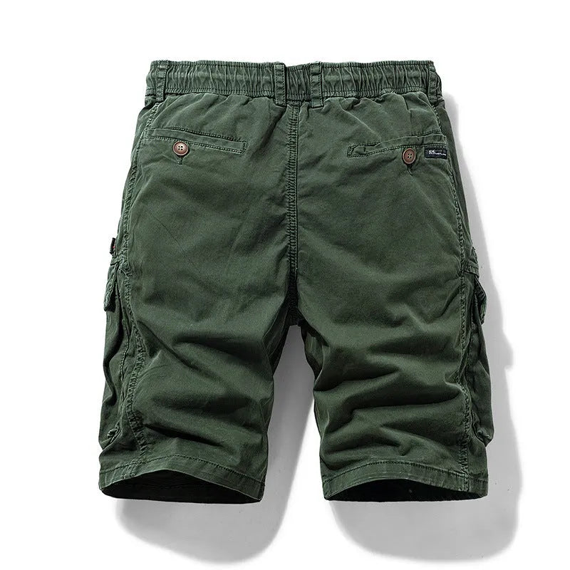 Men's army green cotton shorts with a zipper fly and multiple pockets, laid flat.