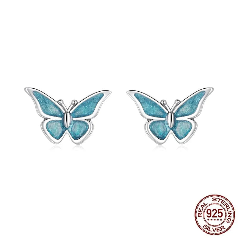925 sterling silver blue butterfly small ear studs for women with dripping oil colour finish on white background