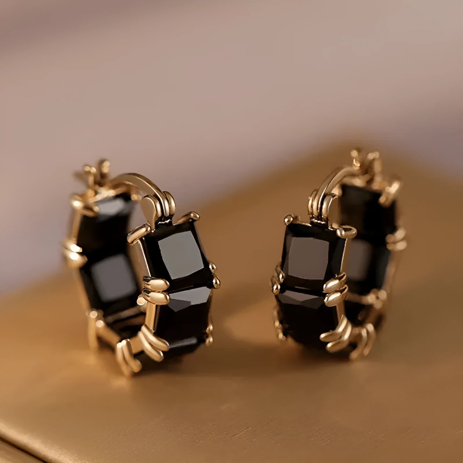 Gold-plated geometric ear ring with U-shaped design and round elements