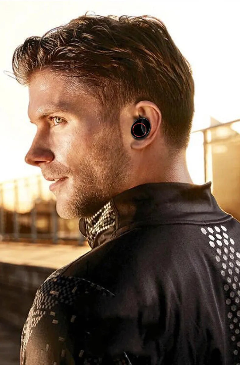 Black X11 Bluetooth wireless earbuds with charging case and six silicone ear tips