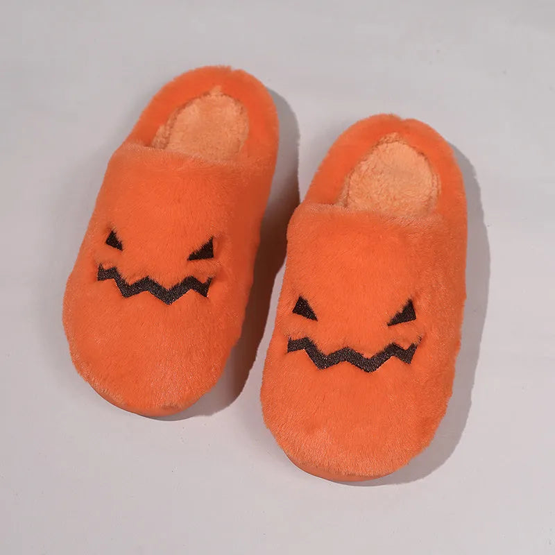 Orange Halloween pumpkin slippers with plush lining and textured coral velvet uppers