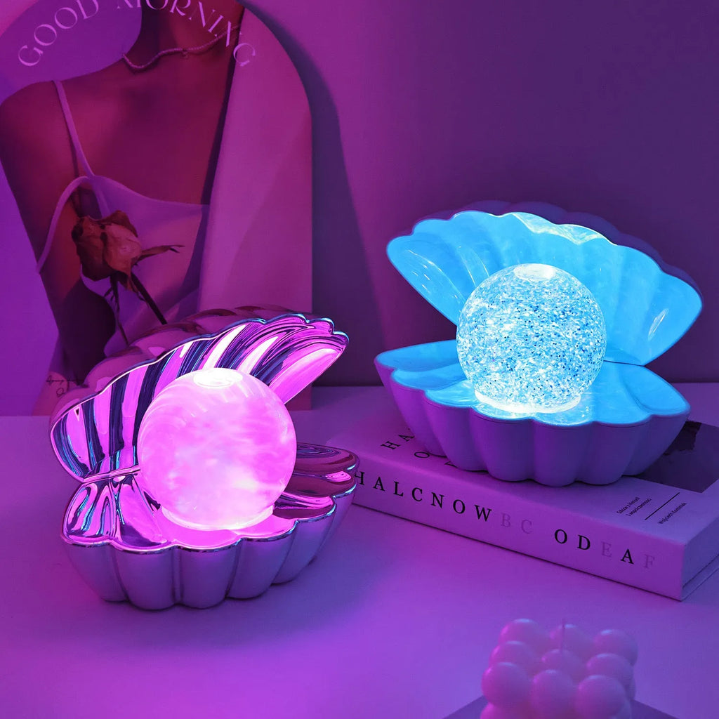 Shell-shaped small neon night lamp with battery power for ambience lighting.