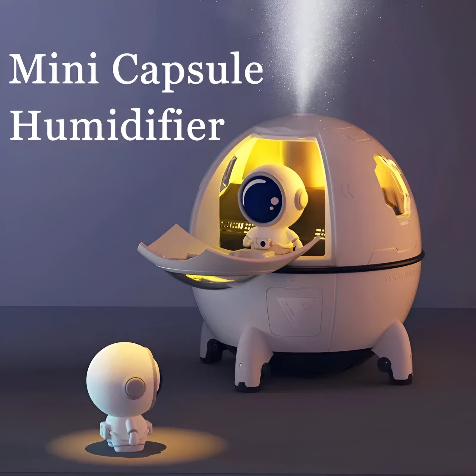 Purple astronaut-themed desktop USB humidifier with LED light next to USB cable on a desk.