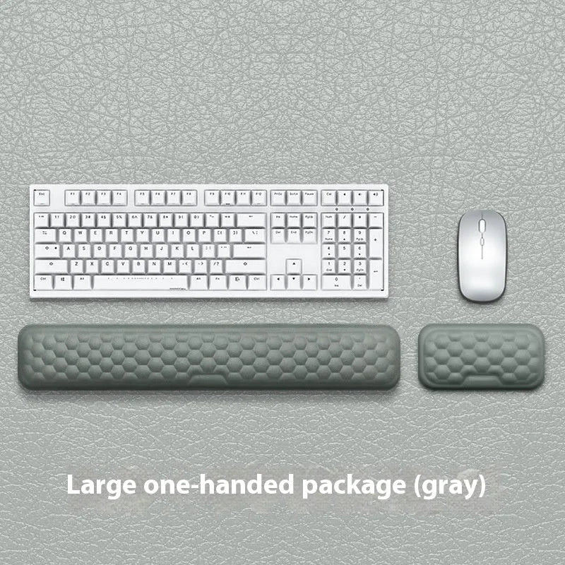 Grey and black memory foam mouse wrist pads with silicone bases, shown in cloth and leather cover options.