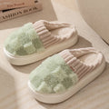 Women's plush indoor slippers in grey with coral velvet upper and flat PVC sole.