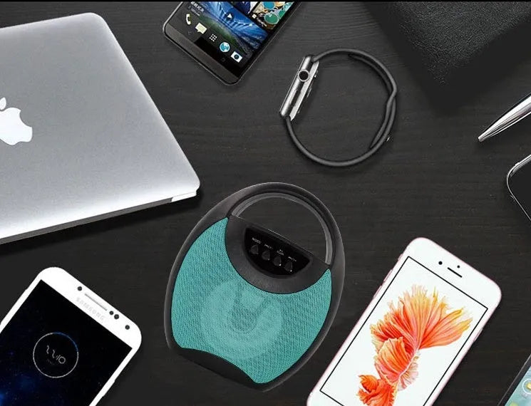 Portable Bluetooth speaker in black, blue, or pink colours with USB port and SD card slot visible