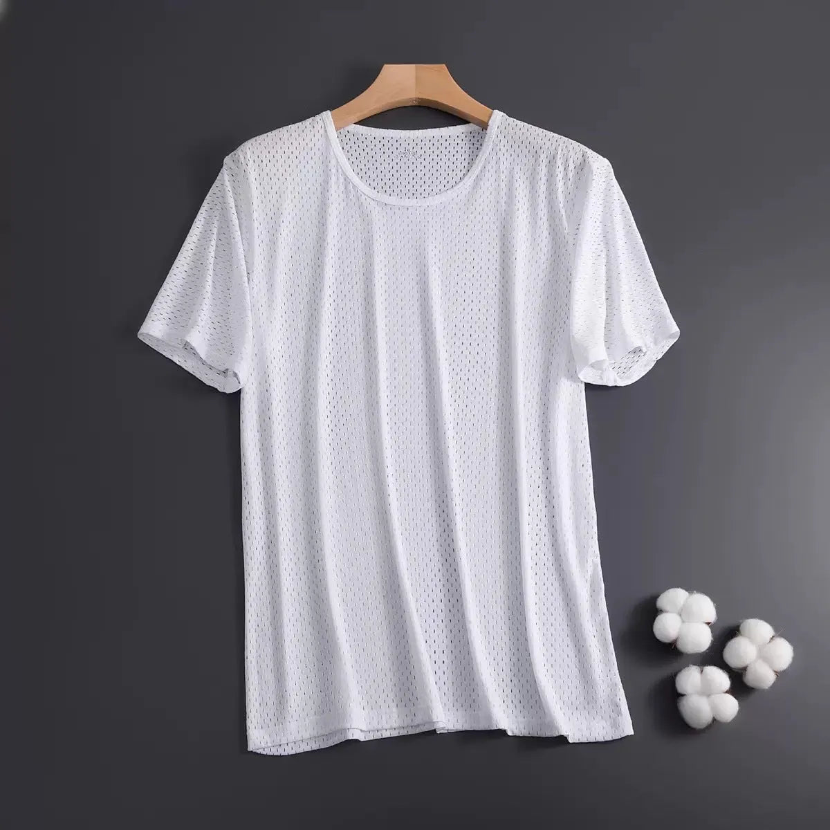 Men's solid colour ice silk short sleeve t-shirt on a hanger, showing loose crew neck and thin mesh fabric.