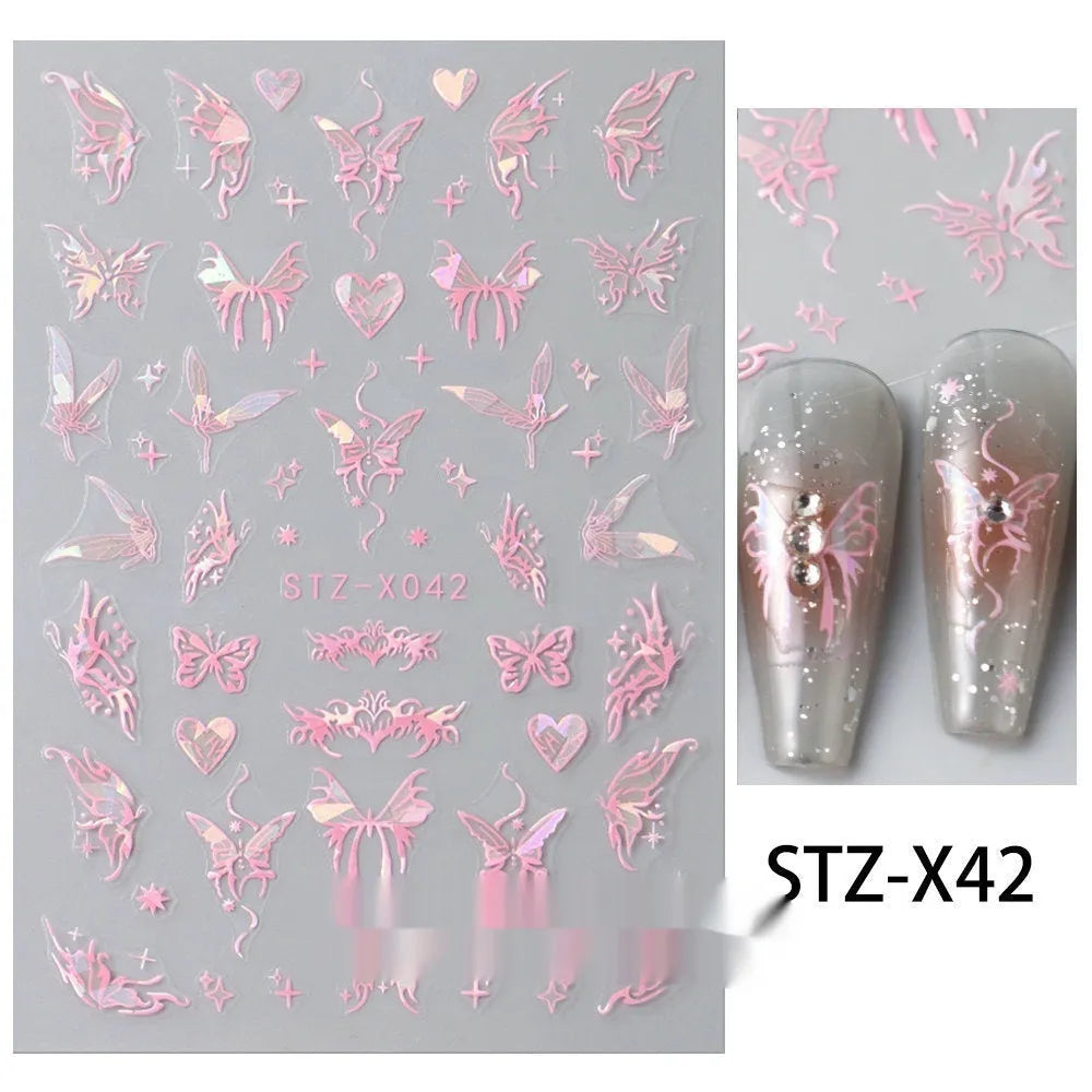 Pack of black and silver strip nail art stickers with cartoon and love pattern designs.