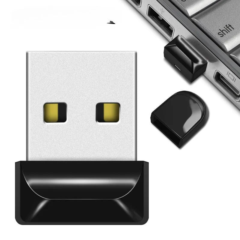 Small silver car-shaped metal USB flash drive on a chain necklace.
