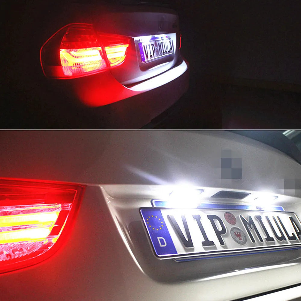 Pair of white LED license plate light bulbs for Volkswagen cars with Canbus resistors.