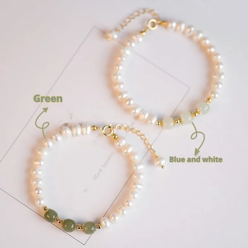 Natural freshwater pearl bracelet with diamond-shaped beads in Hetian jade colour on wrist