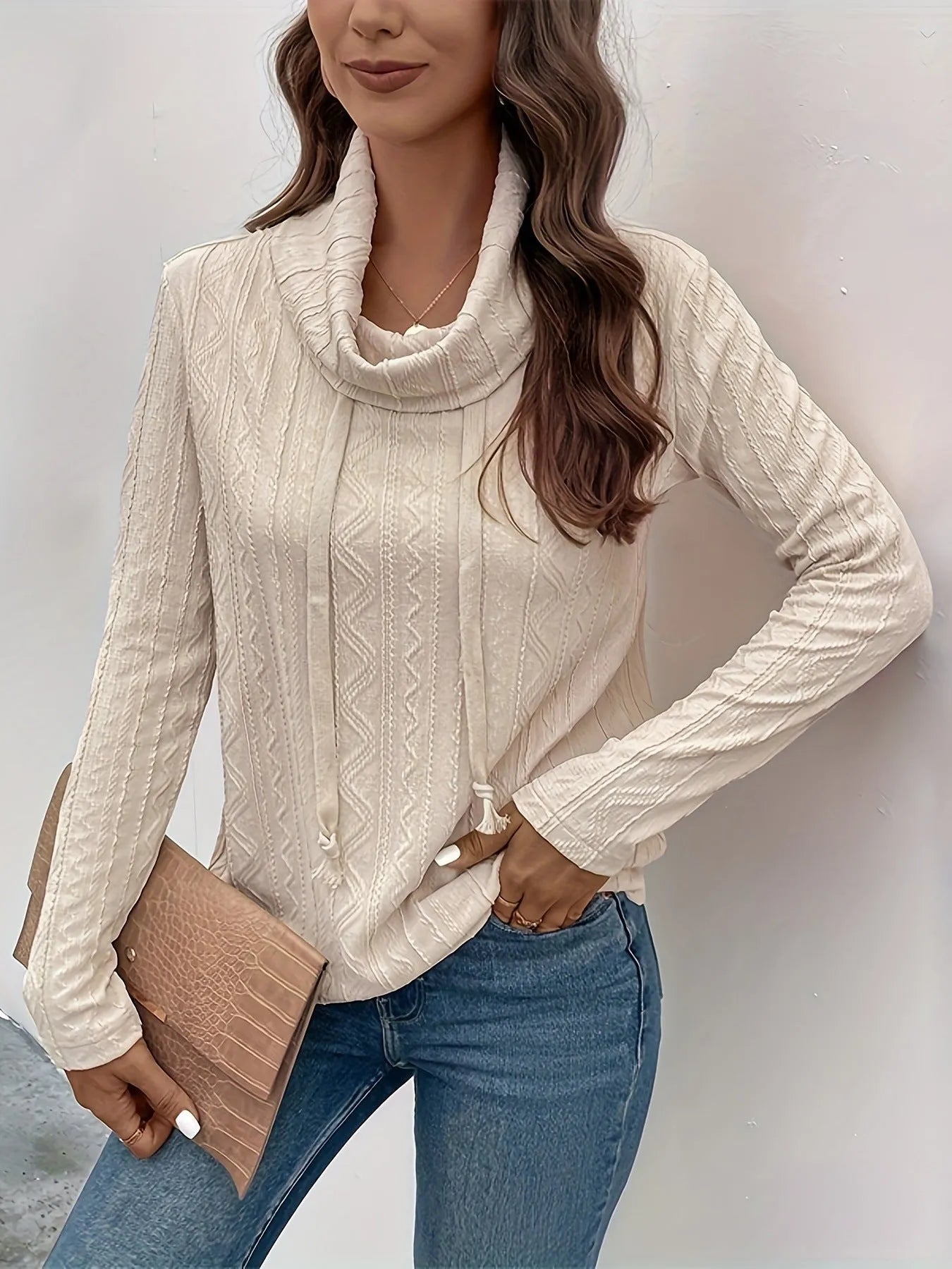Apricot coloured women's hooded pullover sweater with long sleeves and a front drawstring.