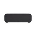 Black and white flame effect aroma diffuser with remote control on a table