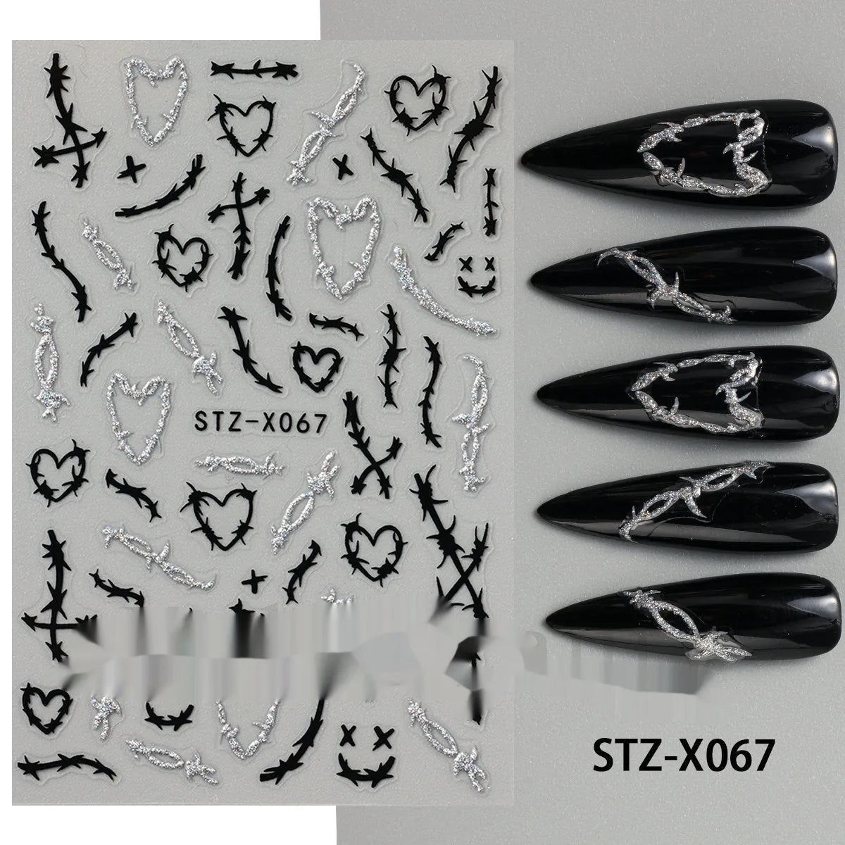 Pack of black and silver strip nail art stickers with cartoon and love pattern designs.