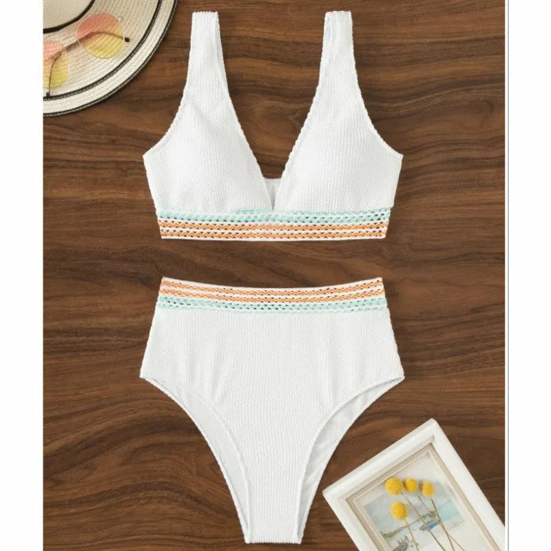 Women's high waist solid colour bikini swimsuit set in pink or white.