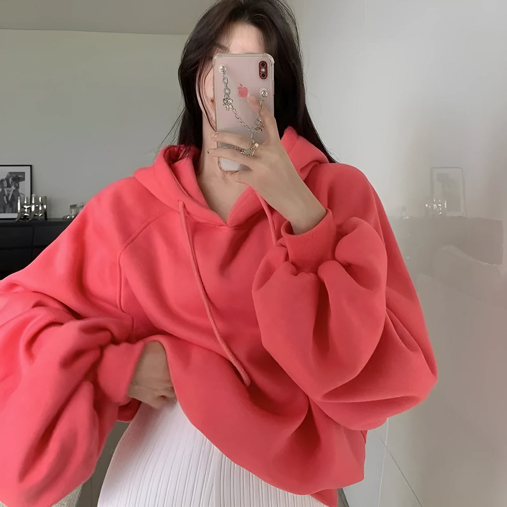Women's loose hooded sweater in watermelon red made from mulberry silk fabric showing front view