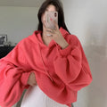 Women's loose hooded sweater in watermelon red made from mulberry silk fabric showing front view