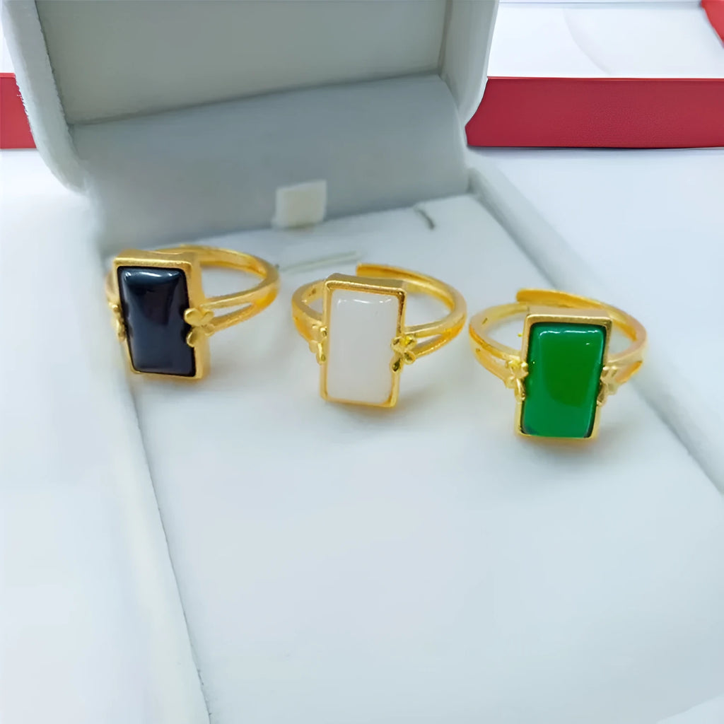 Adjustable brass gold-plated ring with black gemstone inlay and electroplated finish