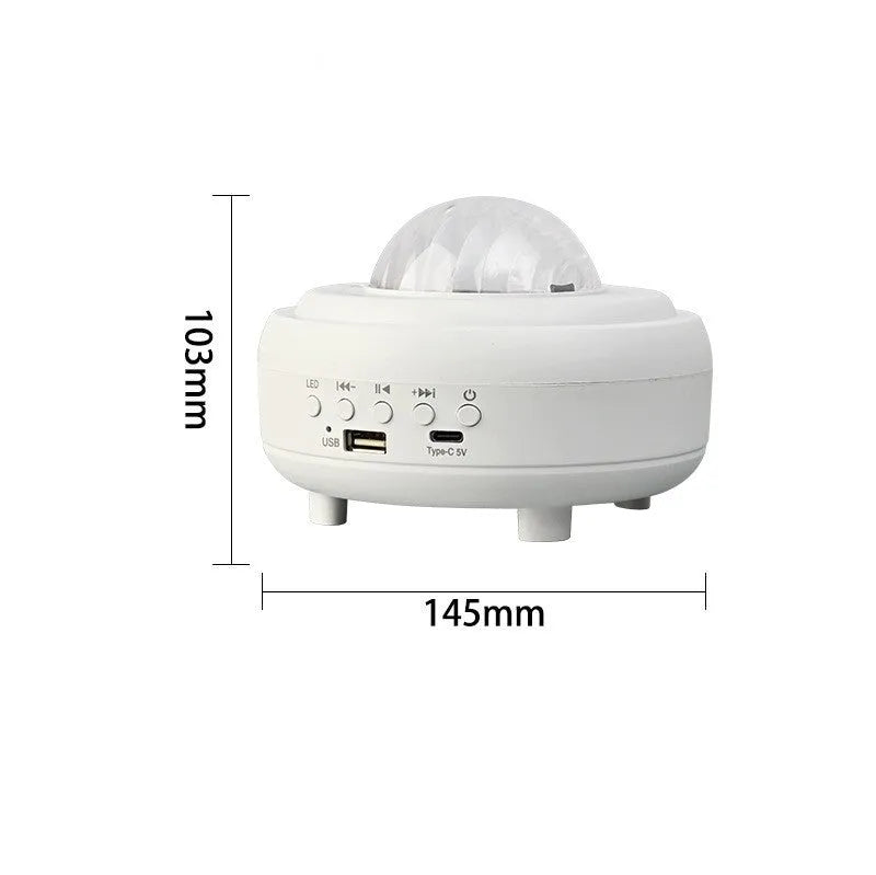 White Galaxy Star Projector Night Light showing star projection on wall next to a smartphone