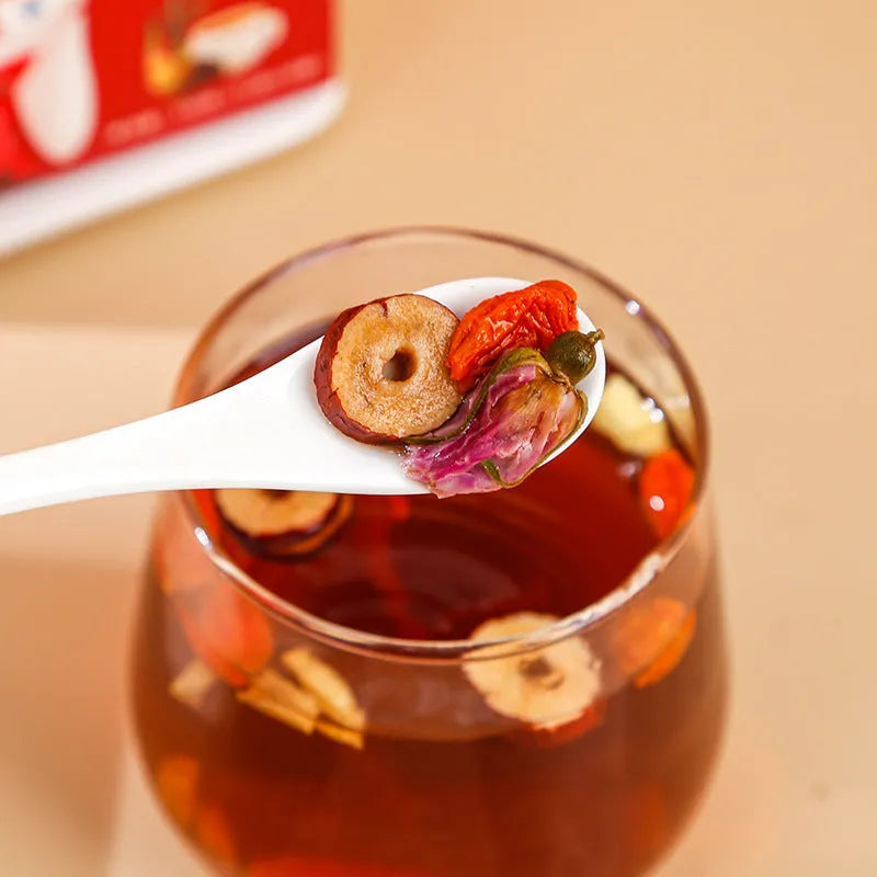 Box of brown sugar ginger and jujube tea with red dates, wolfberries, and herbal ingredients