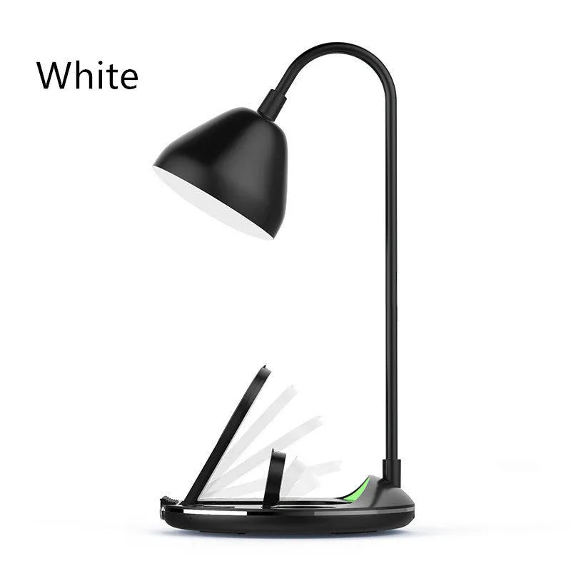 Black magnetic folding wireless charger unfolded showing phone, earbuds, and watch on charging pads