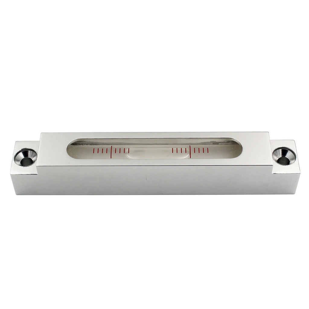 Mini metal and glass spirit level showing dual accuracy scales for precise measurement