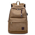 Canvas shoulder backpack with USB charging port in coffee colour showing computer pocket and main compartment