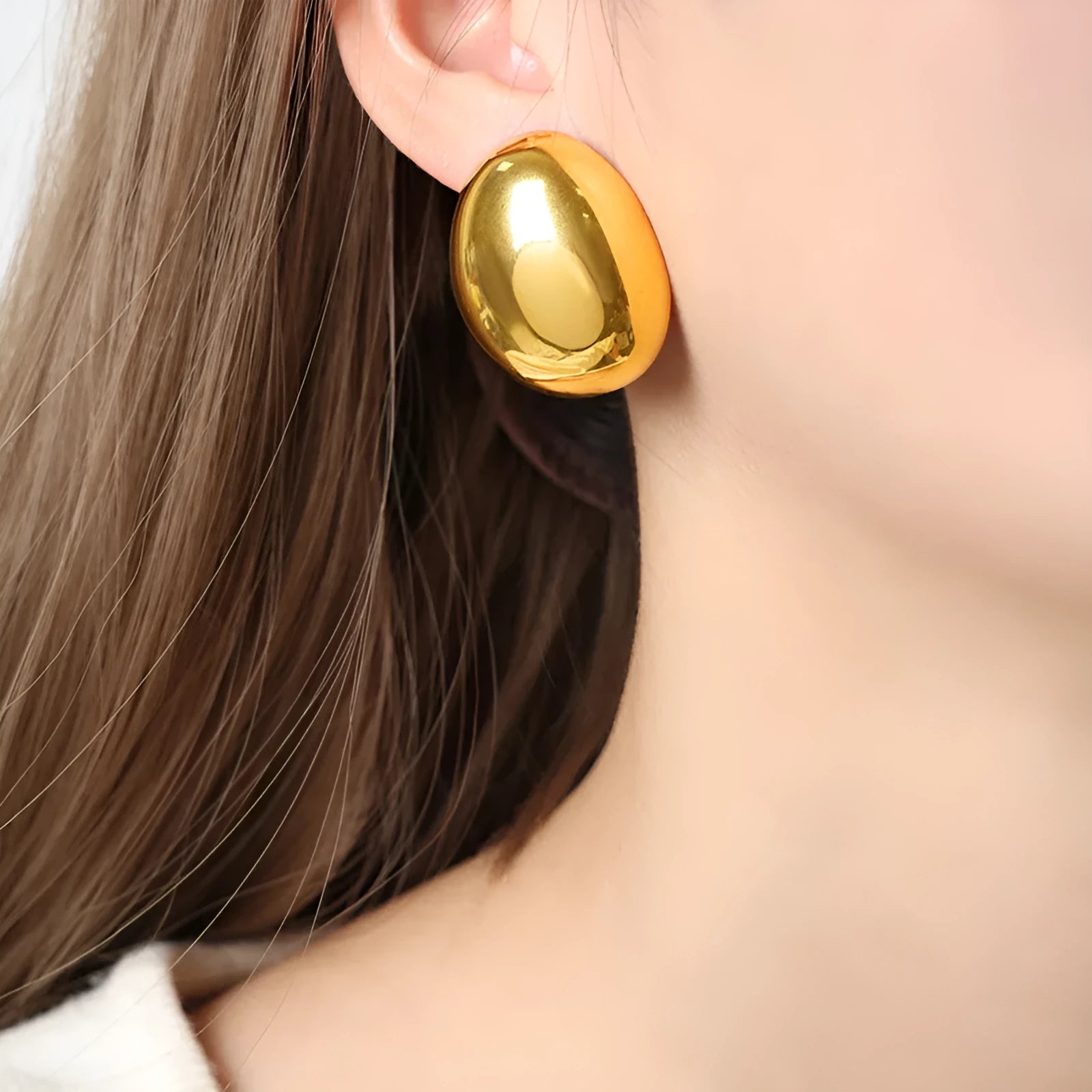Geometric line ear studs with 18K gold electroplated finish and glazed surface on stainless steel