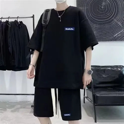 Cotton-blend waffle textured leisure sports suit with short sleeves and shorts.