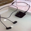Black Bluetooth audio receiver with lavalier headset for wireless running headphones