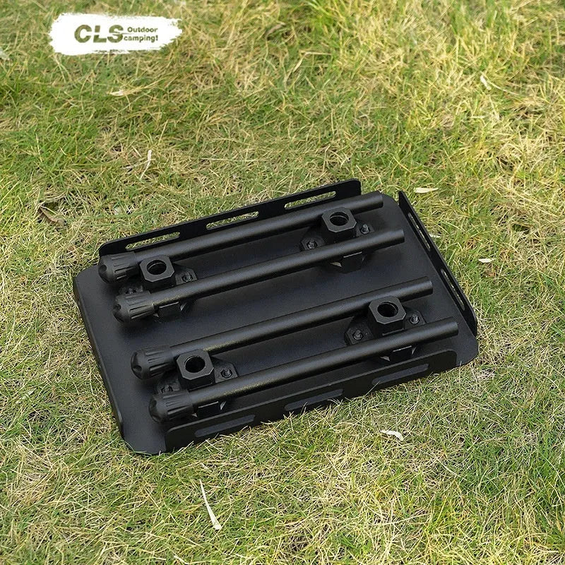 CLS aluminium alloy dual-use folding camping table shown converted into a stool with a green PU mat cushion.