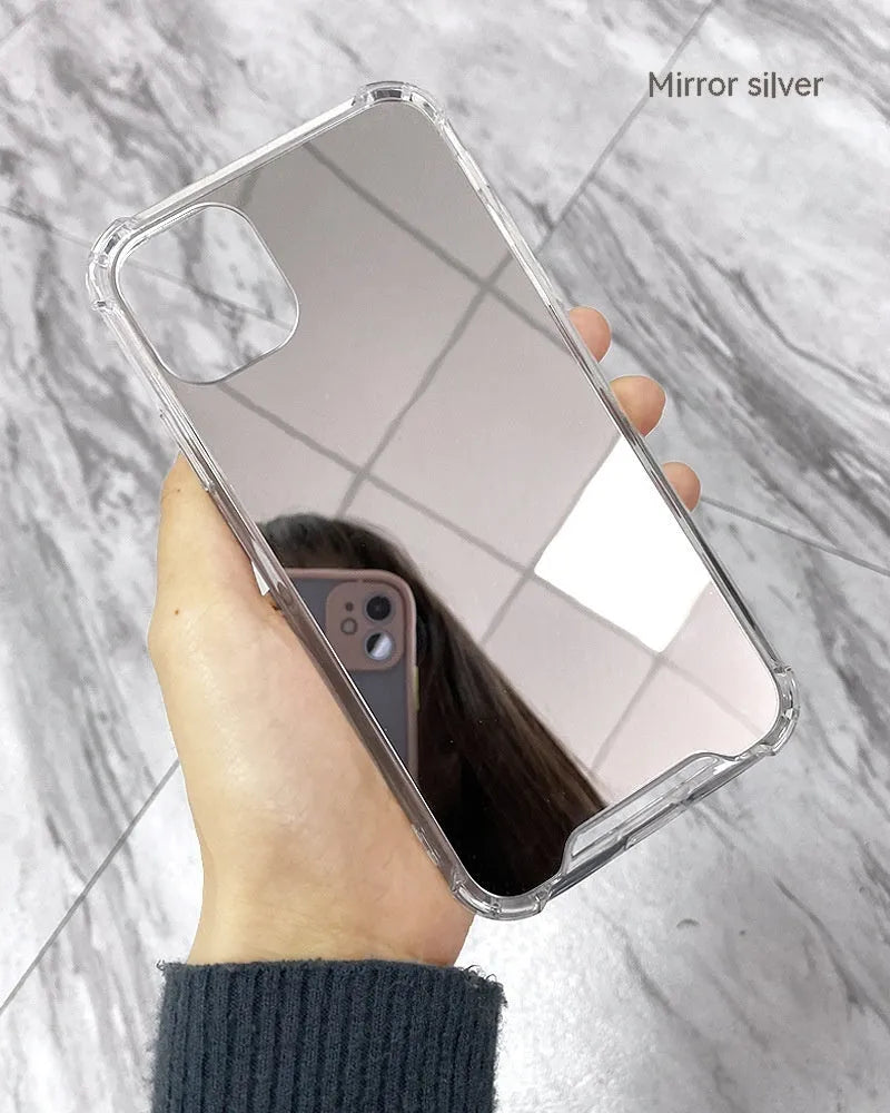 Silver mirror finish hard PC phone case for Apple iPhone on a table.