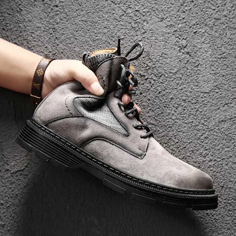 Men's vintage Martin boots in black with round toe, thick low heel, and rubber sole.