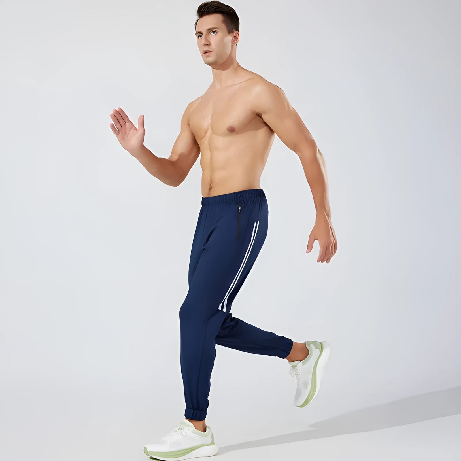 Men's black running trousers with mid waist fit and full length design for sports activities