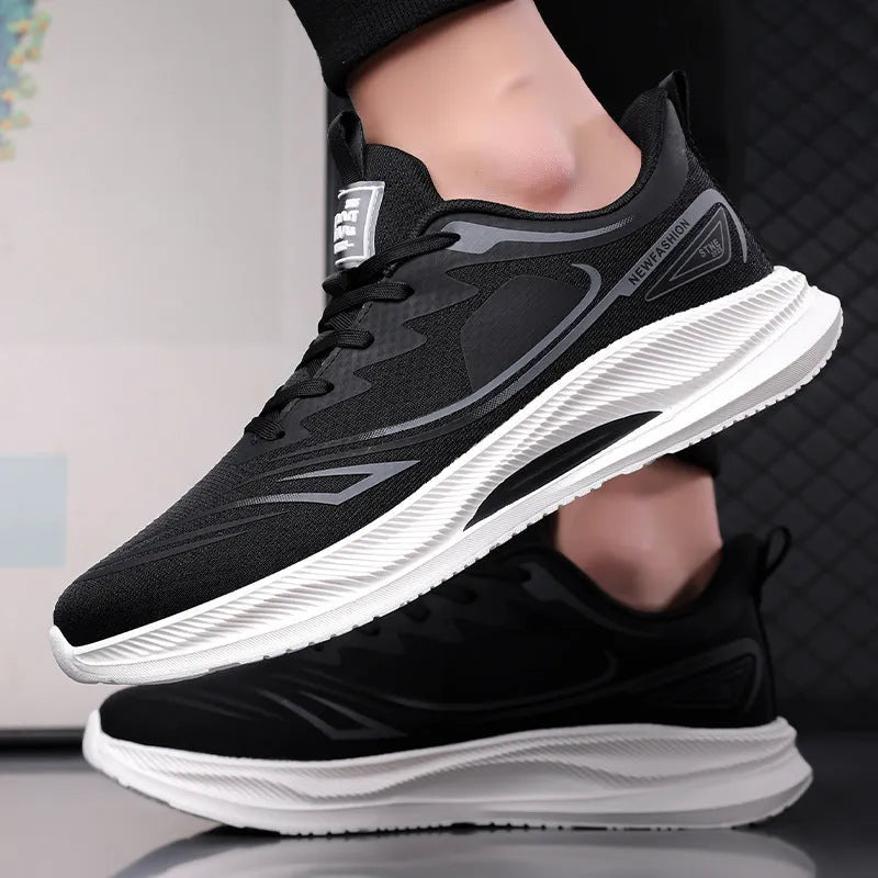 Men's low-top casual shoes in mesh with round toe and rubber sole, shown in black, blue, and grey-green colours.