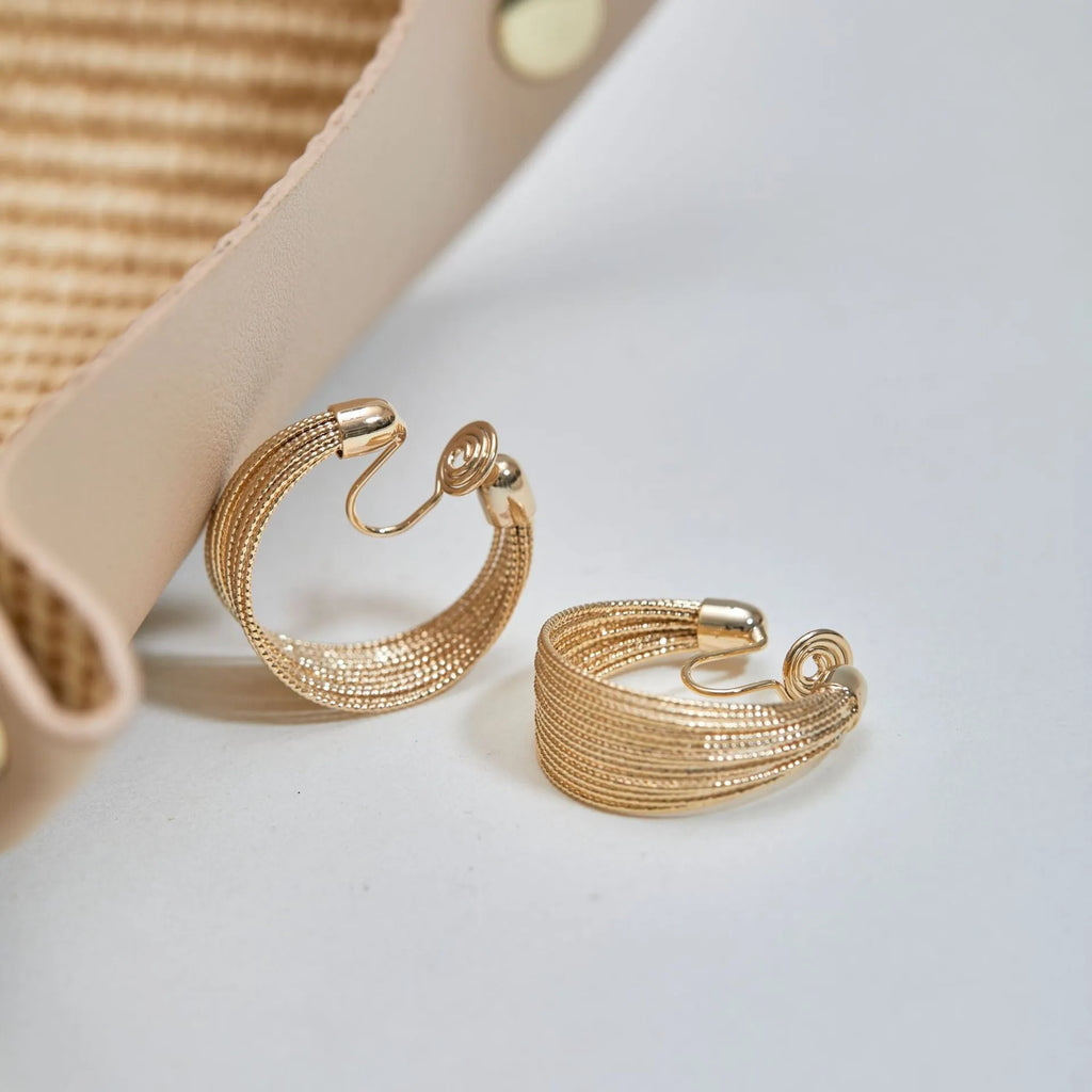 Geometric multi-layer simple bracelet earrings in gold and silver finishes with copper construction