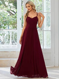 Women's light green sleeveless banquet dress with pleated A-line long skirt on a mannequin.