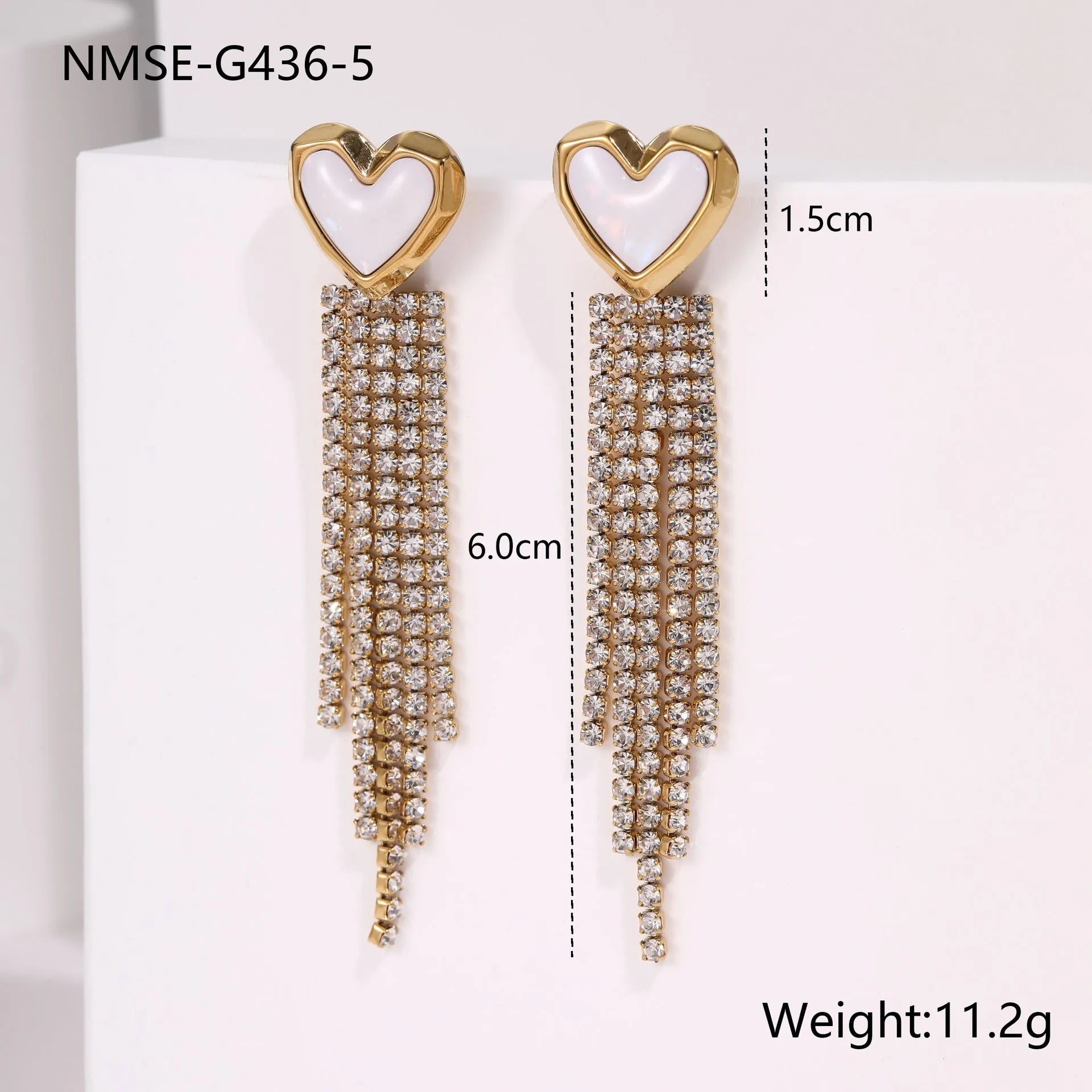 Stainless steel earrings with diamond tassel designs in heart, star and geometric shapes with 18K electroplated finish