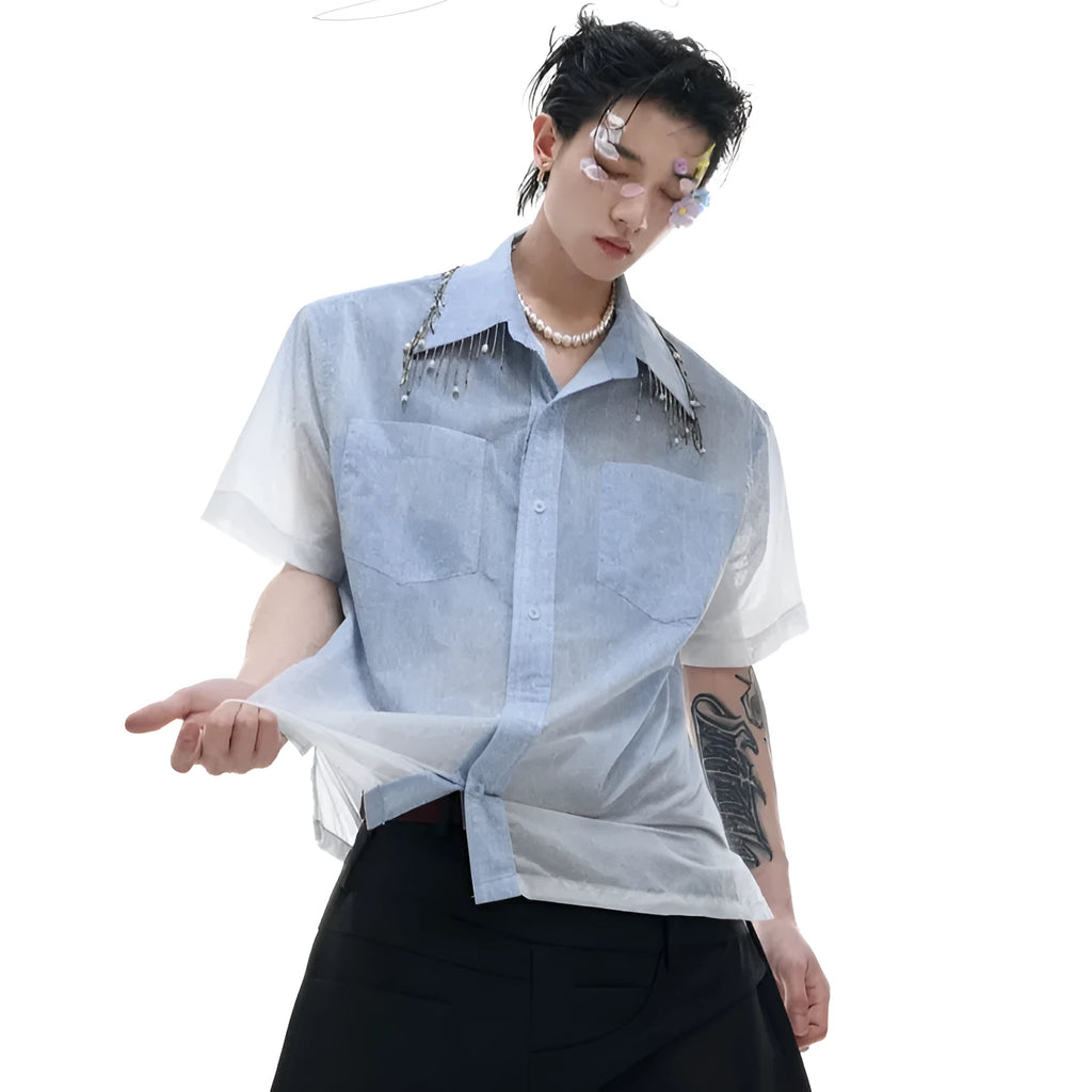 A loose-fit blue men's short sleeve shirt with a white gradient fade.