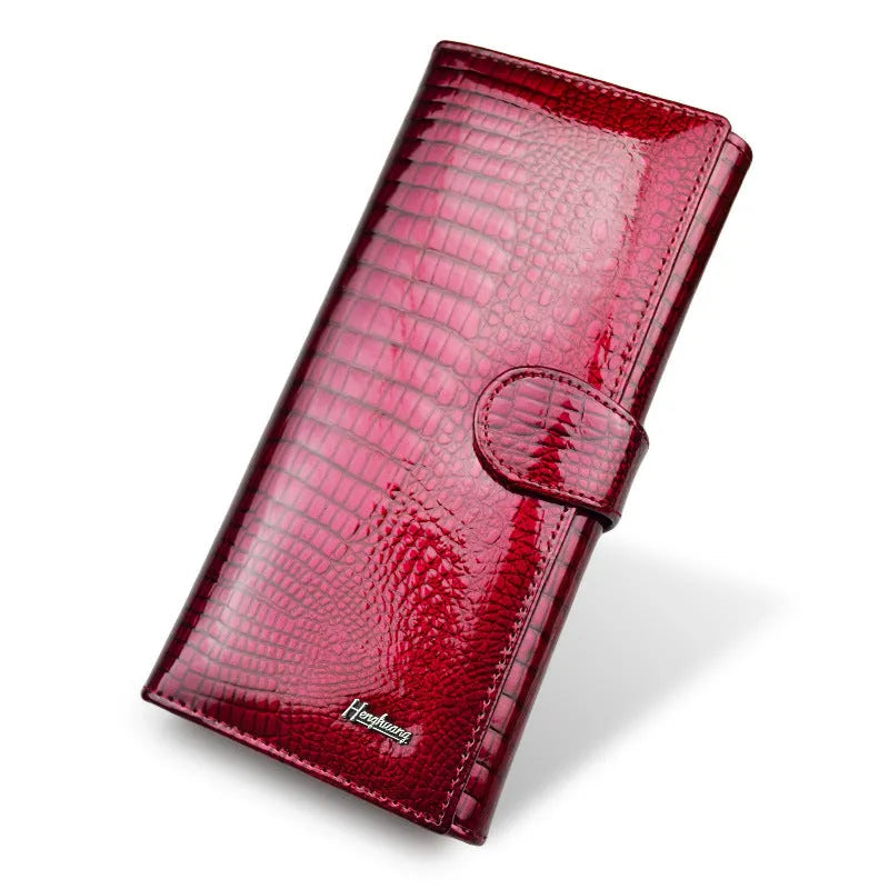 Women's genuine leather coin purse with crocodile pattern detailing in red, wine red, and black colour options