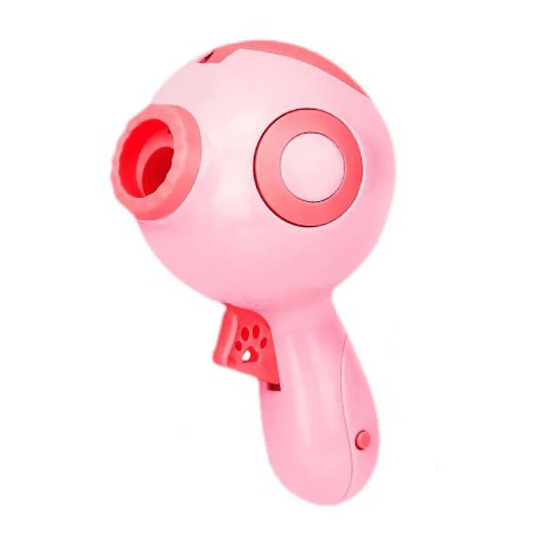 Green orange pink dog treat launcher toy measuring 15.5cm x 9cm x 8.5cm