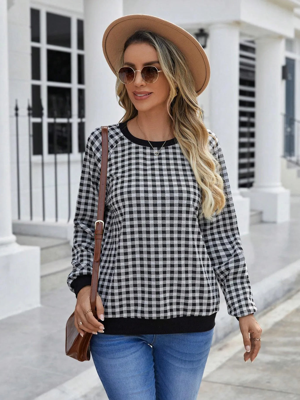 Black Japanese plaid pattern long sleeve polyester sweater showing front view with regular sleeves