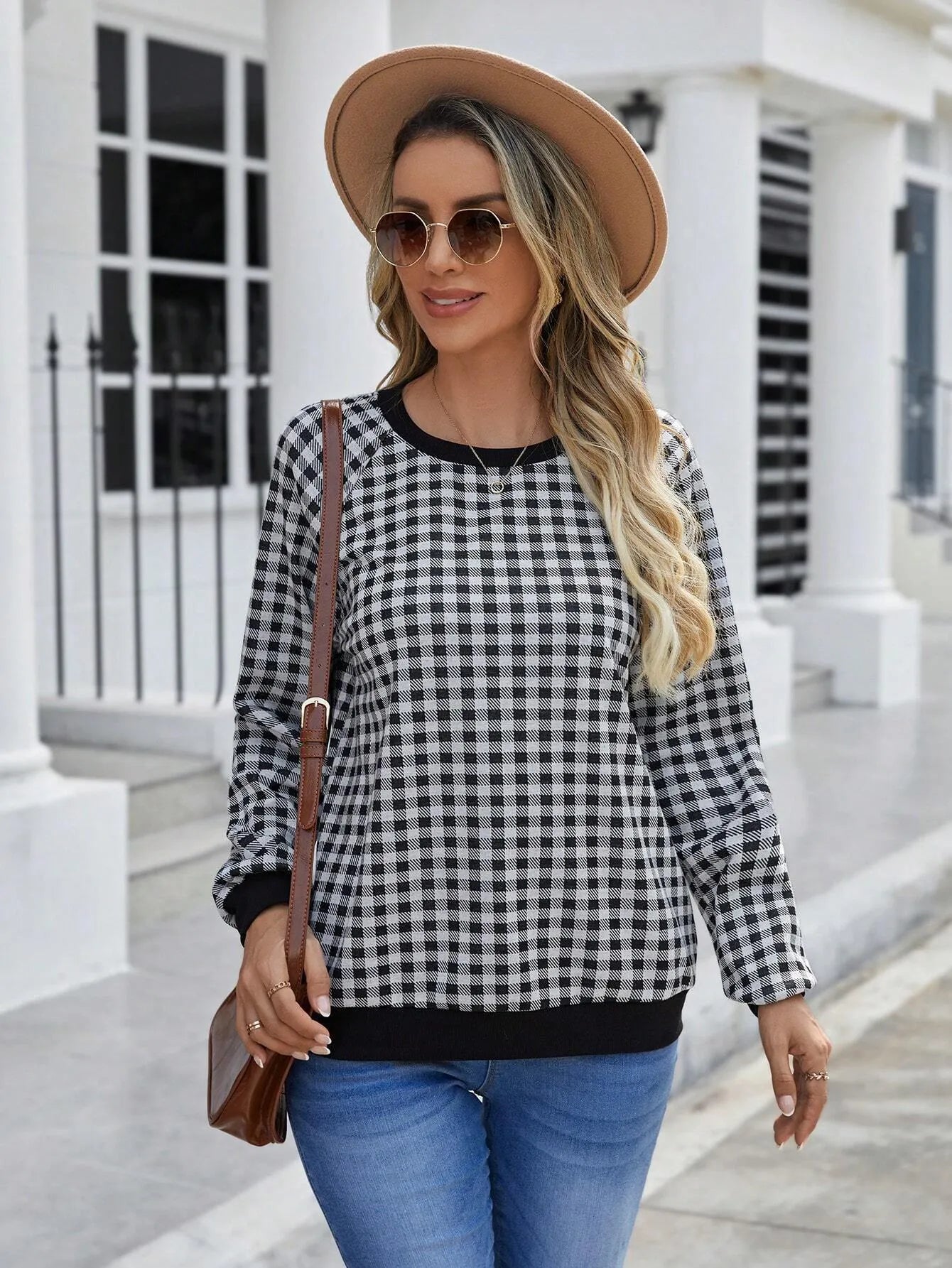 Black Japanese plaid pattern long sleeve polyester sweater showing front view with regular sleeves