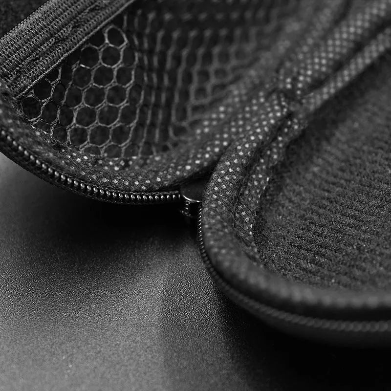 Black oval leather hard-shell case for EDX PRO and ZEX PRO earphones.