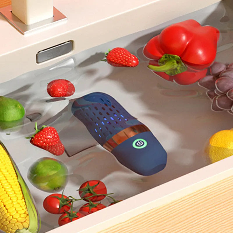 Blue capsule fruit and vegetable purifier with mechanical button and USB charging, placed in water