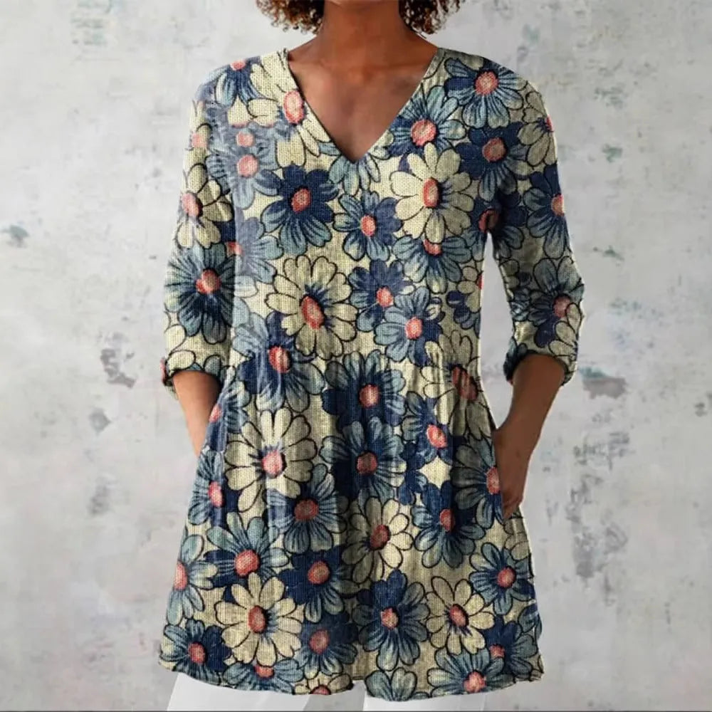 Women's retro-style slim fit long-sleeved top with a digital print pattern, shown on a hanger.